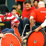 A Team of Wheelchair Rugby players in action playing a match